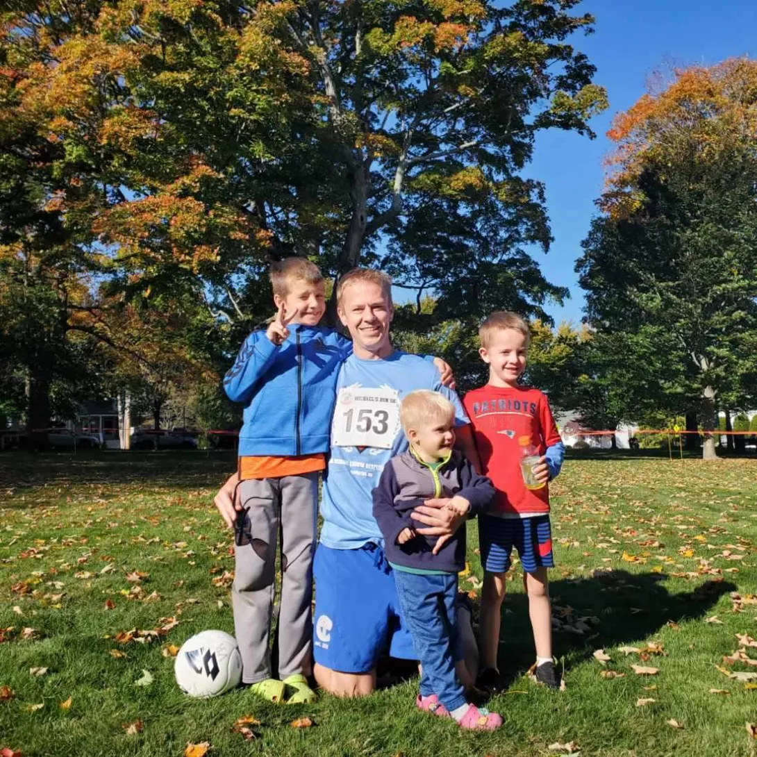 grant with his kids after a race